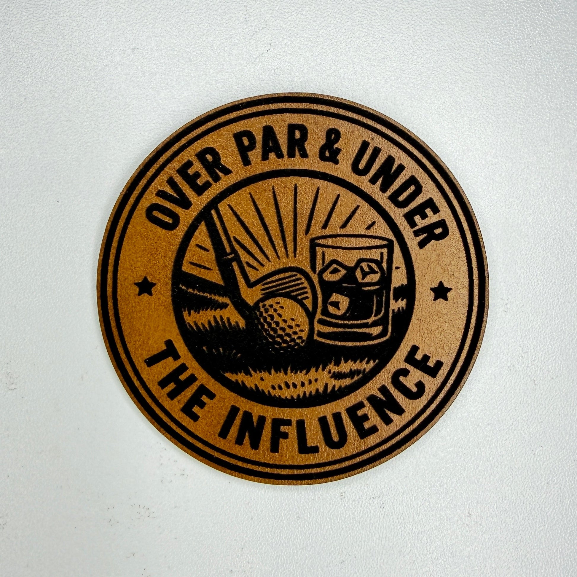 Circular logo with text 'Over Par & Under The Influence' on a white background